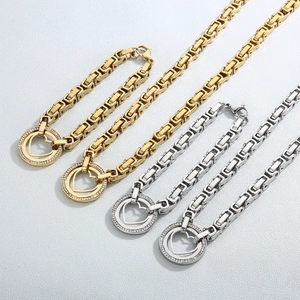 Detail view of Byzantine chain necklace and heart pendant in gold and silver finish