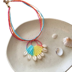 Bohemian colorful raffia necklace with natural white shells for summer beach vacation