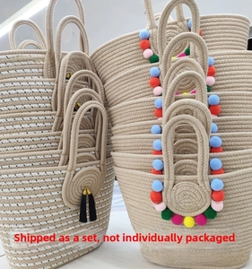 Detail view of Bohemian woven cotton rope beach bags with tassels and pom-poms
