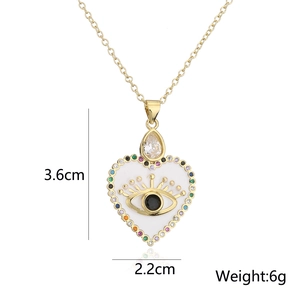 Detail showing 3.6x2.2cm heart pendant with evil eye and zircons for gold necklace