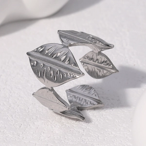 Minimalist adjustable leaf ring in silver stainless steel with detailed vine texture