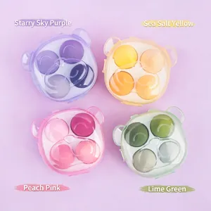 Set of 4 soft beauty sponges in a bear-shaped storage case with multiple pastel colors