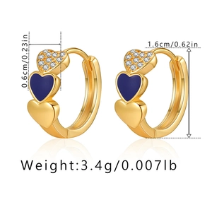 Macro shot of triple-layer heart earrings with blue enamel and zircon dimensions