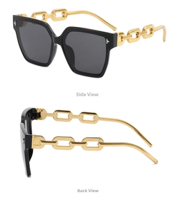 Detail of oversized square sunglasses with gold chain temples and star accents