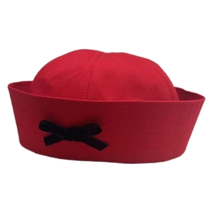 Sweet red striped sailor cap for women with a cute black bow detail on a white background