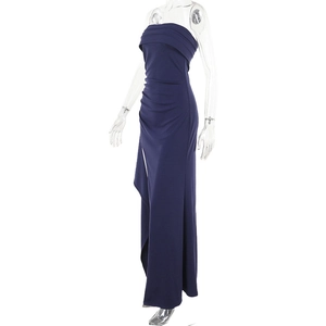 Detail of navy strapless knit dress with side pleats and elegant thigh-high slit