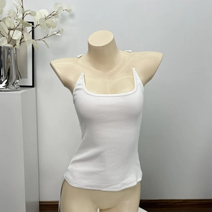 Detailed view of white ribbed knit tank top with invisible transparent shoulder straps