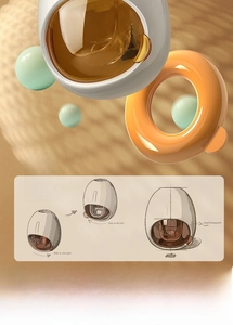 Macro view of automatic vacuum toothpaste squeezer with orange transparent window