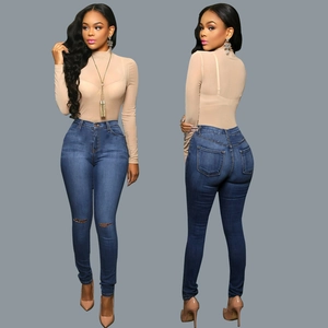 Women's dark blue skinny jeans featuring knee rips and a slimming high-waisted fit