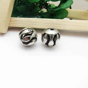 Set of two vintage silver alloy beads with hollow fish engraving for DIY jewelry