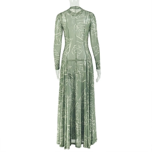 Detail of sage green long sleeve mesh maxi dress with white leaf print texture
