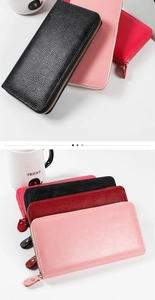 Close-up of long women's wallets in various colors with lychee texture and gold zipper