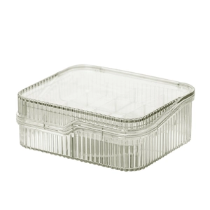 Two-layer clear plastic jewelry box with ribbed texture and multiple storage compartments