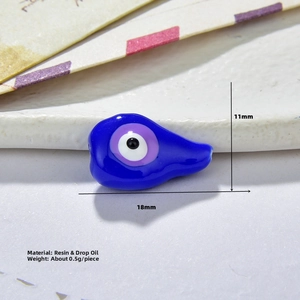Macro shot of 18x11mm resin Evil Eye bead for DIY jewelry making and handmade accessories