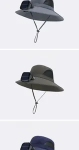 Detail of three sun hats with dual solar fans and wide brims for outdoor cooling protection