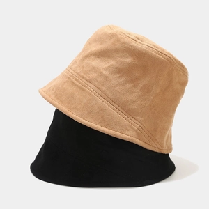 Minimalist faux suede bucket hat in camel and black, stylish short brim design for outdoor