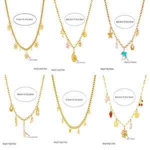 Gold stainless steel ocean series necklaces with dolphin, starfish and shell pendants
