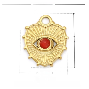 Detailed view of gold heart pendant with red evil eye, 15x17mm stainless steel charm
