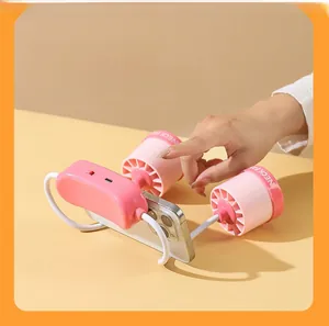 Pink portable neck fan with flexible silicone tube used as a phone stand on desk