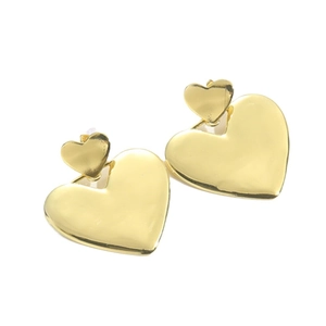 Golden heart stud earrings with hammered metal texture in a minimalist stacked design