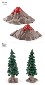 Detail view of miniature volcano and layered pine tree models for prehistoric playsets