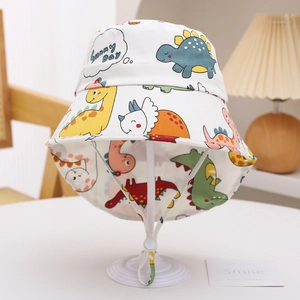 Detail of kids cartoon dinosaur sun hat featuring adjustable chin strap and Sunny Day print