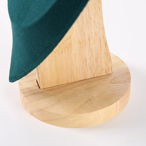 Solid wood jewelry bust display stand with green velvet and natural wooden round base