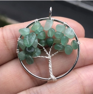 Handcrafted tree of life pendant with silver wire and green natural stone chips
