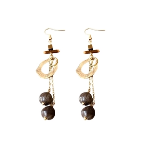 Bohemian irregular ring earrings with long gold chains and dark grey fruit seed beads