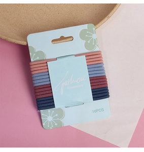 Close-up of 16-piece set of high-elastic seamless hair ties in Morandi colors on floral card