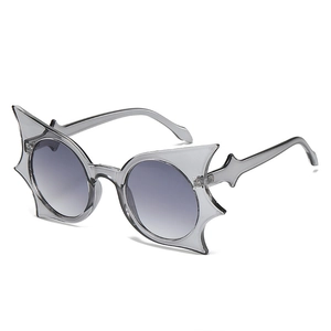 Fashionable butterfly-shaped sunglasses with grey gradient lenses and oversized frames
