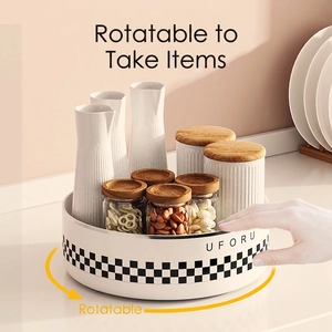 Rotating kitchen spice organizer with checkerboard pattern and seasoning bottles