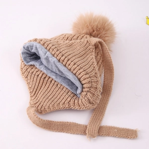 Winter knit baby hat with earflaps, camel faux fur pompom, and warm cotton lining