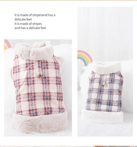 Detail of warm checkered pet vest with plush fur collar and integrated metal D-ring leash attachment