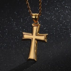 Polished golden stainless steel cross pendant necklace with a classic twist chain design