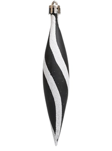 Detail of spindle-shaped black Christmas ornament with white glitter wave patterns
