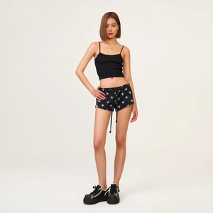 Women's black outdoor utility shorts and knit crop top set with platform sneakers