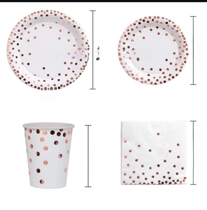 Detail of rose gold polka dot party set with 50 counts of plates, cups and napkins