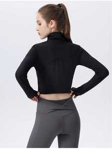 Rear view of slim-fit black sports jacket with curved stitching and thumbhole cuffs