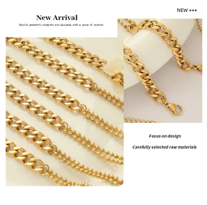 Detail of 18k gold plated titanium steel bracelet showing thick chain and bead textures