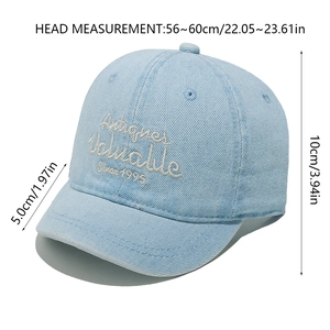 Detail showing light blue denim baseball cap with Antiques embroidery and size specs