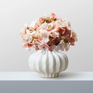 Modern white ceramic vase with vertical textures and faux hydrangea flowers home decor