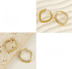 Detail of 18K gold plated earring with Greek fret pattern and sparkling crystals