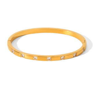 Macro shot of 18k gold plated stainless steel bracelet with embedded cubic zirconia