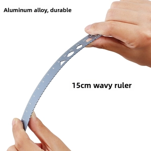 Macro shot of flexible 15cm aluminum wave ruler demonstrating anti-breakage durability