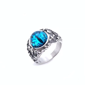Gothic vintage stainless steel bat ring featuring a blue demon eye center and wing relief