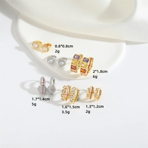 Minimalist gold and silver earrings set with zircon studs and sizes and weights info