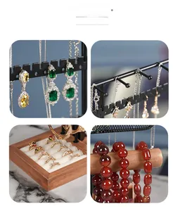 Detail view of jewelry organizer showing metal earring rack and wooden ring tray