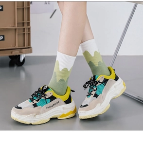 Detail of color-block chunky sneaker in mesh and suede with embroidered number 37