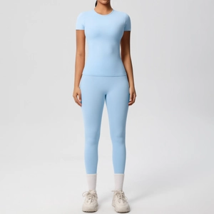 Women's light blue seamless yoga set with short sleeve t-shirt and high waist leggings